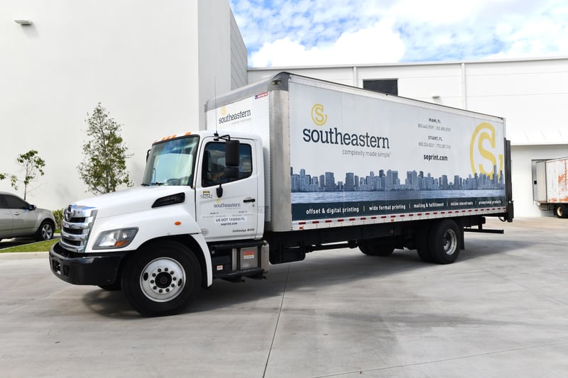 A Southeastern truck parked outside a warehouse